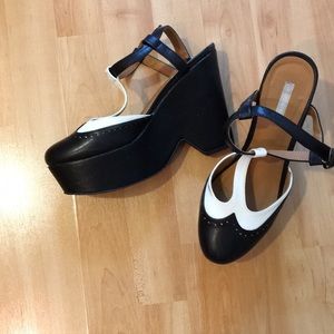 Platform wing tip shoes